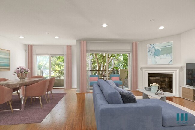 Amplio comedor y sala de estar con iluminación empotrada, pisos de vinilo, chimenea eléctrica y balcón. - Purdue Ohio by Wiseman