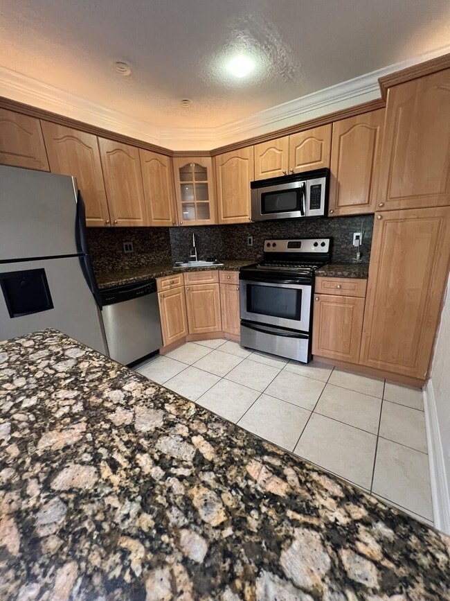 Building Photo - 3857 Coral Tree Cir Unit 307