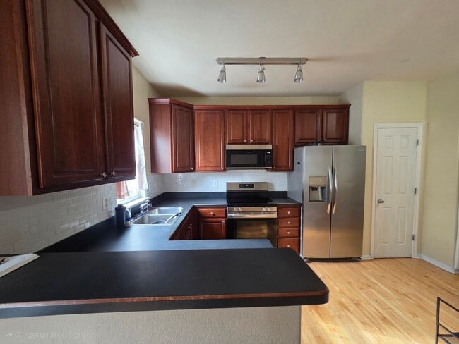 Photo - 3BD/3.5BA Townhouse in Town Center! with Garage and Patio- First Floor Primary Suite