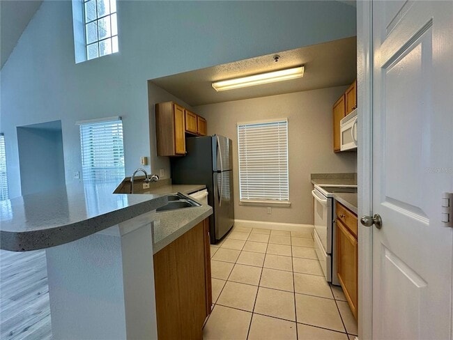 Photo - 9141 Lee Vista Blvd Unit 303