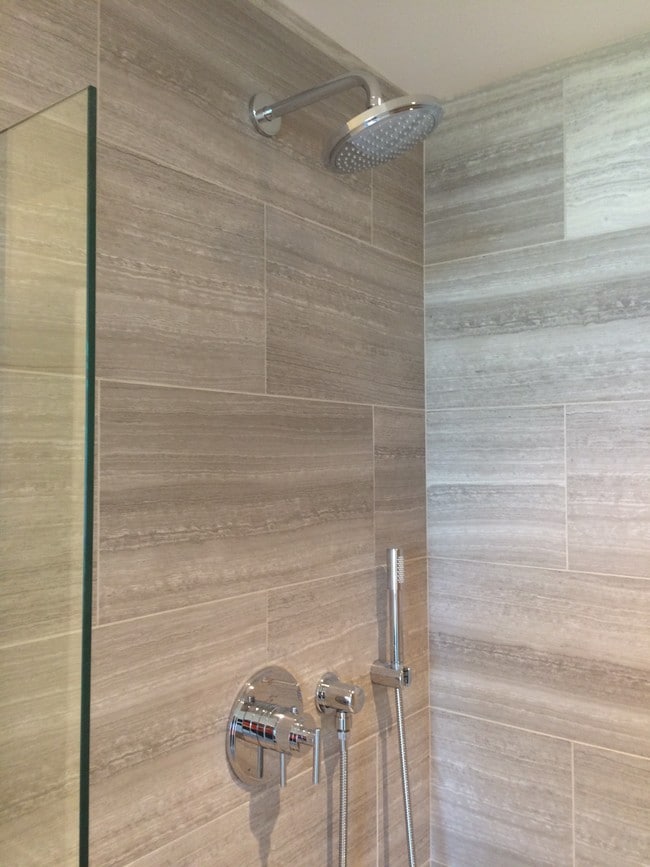 Glass-door show and travertine tile - 1275 NW 10th Ave Unit 307