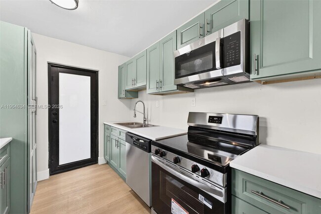 Building Photo - 555 NW 94th St Unit Front