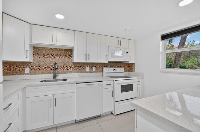 Building Photo - 10110 Boca Entrada Blvd Unit 305