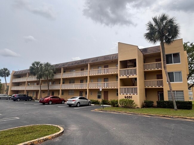 Building Photo - 6051 NW 61st Ave Unit 103