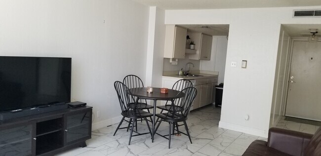 Furnished livingroom & kitchen - 1800 Lavaca St Unit 104
