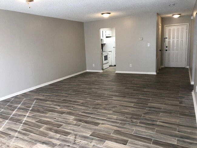 Photo - Charming 2BR Condo with Granite Countertops, Pool Access & Included Lawn Care