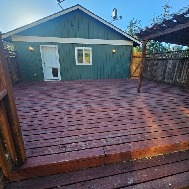Photo - Charming 1-Bedroom Home with Spacious Backyard, 2 car garage & Modern Amenities – Pet Friendly!