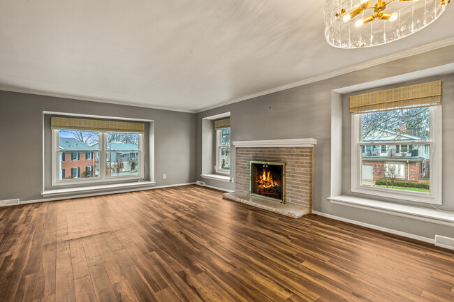 Living Room w/ Gas Fireplace - 3042 E Newport Ct Condo Unit Upper