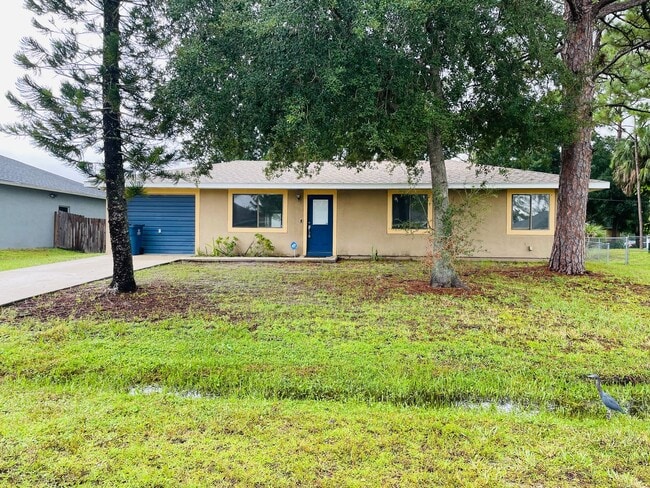 Building Photo - NW Palm Bay 3/2 with 1 car garage and encl... Rental