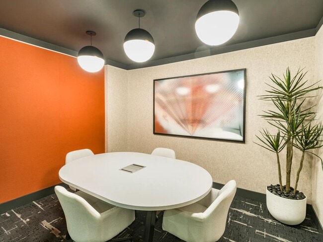 Private meeting space with modern style—ideal for focus, brainstorming, or quick team huddles.