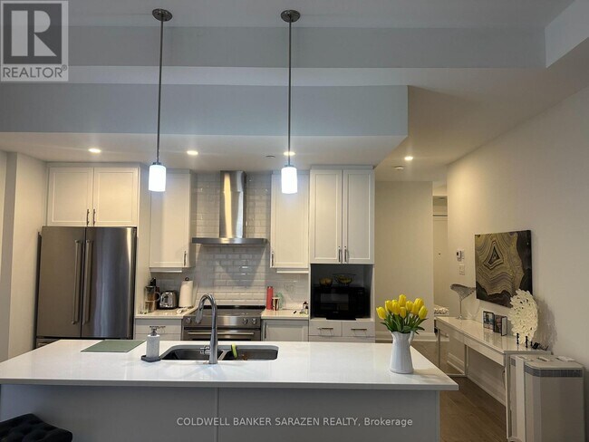 Photo - 100 Cortile Private Unité #101