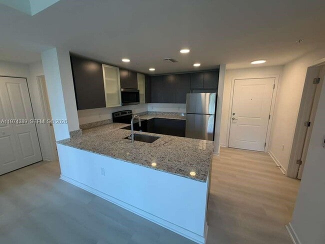 Building Photo - 5587 Millennia Park Dr Unit 209