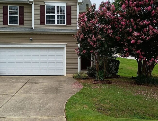 Building Photo - Sought After Riverwood Townhome!