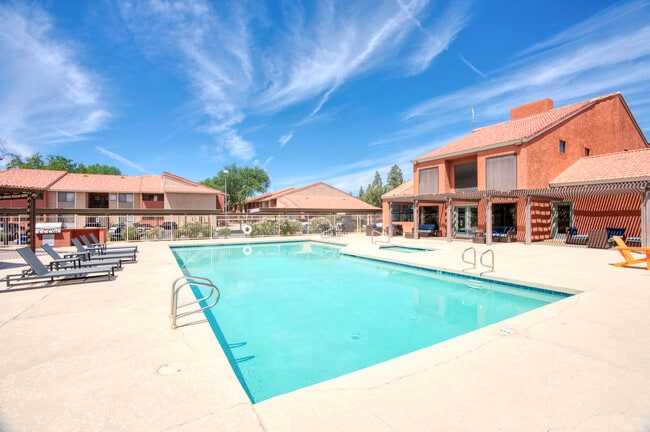 Two resort style swimming pools with cabanas and grills