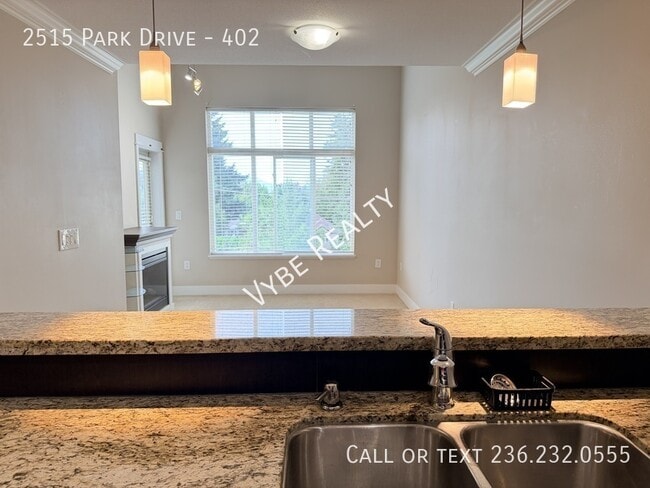 Photo - Top Floor - 2 Parking Spots and Pet Friendly Unit 402