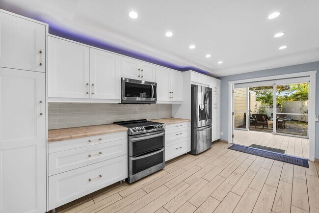 Photo - 3BR / 3BA Kihei Home with Gourmet Kitchen & Outdoor Entertaining Space Unidad 301