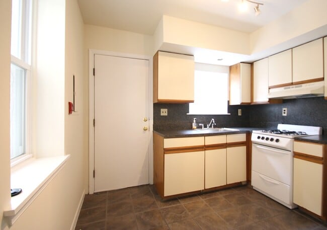Eat in Kitchen with Patio Access - 2320 Catharine St Unit 1