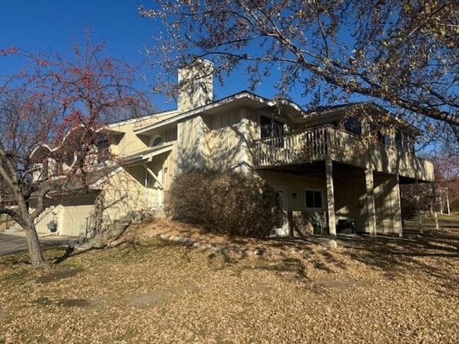 Photo - Beautifully Updated 3 Bed, 2 Bath, 2 Car Garage End Unit Townhome with Vaulted Ceilings