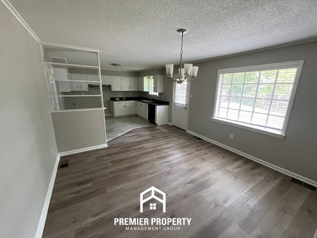 Photo - Spacious 4BR/2BA Home in 38118 | Hardwood Floors & Large Fenced Backyard
