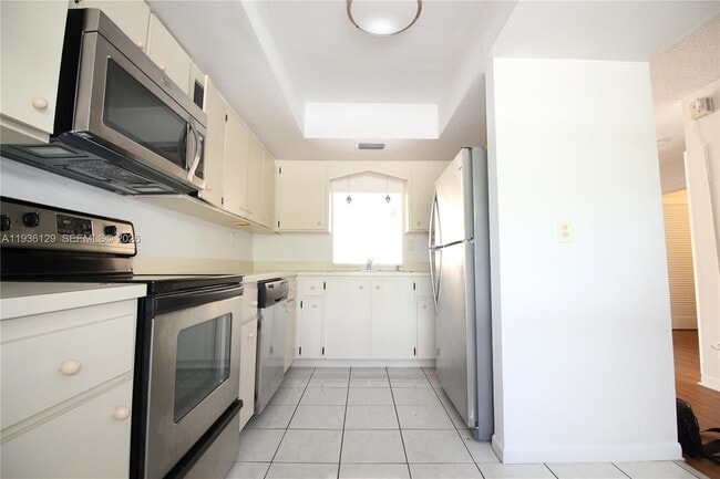 Building Photo - 8990 W Sample Rd Unit 206