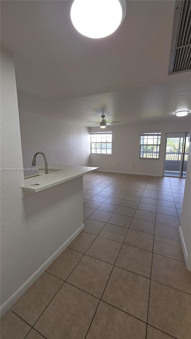 Building Photo - 2881 N Oakland Forest Dr Unit 210