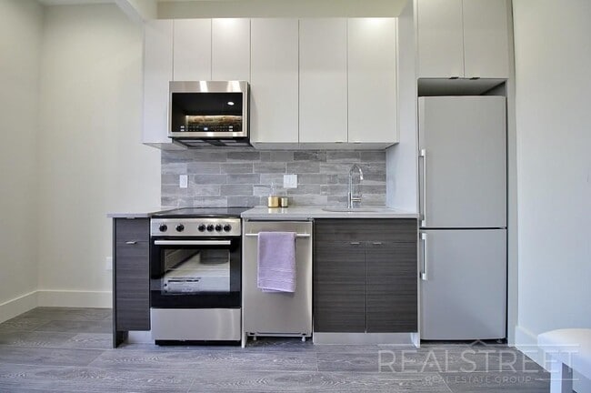 Photo - Stunning New 2 Bed in Crown Heights with Lounge & Backyard! Unit 2B