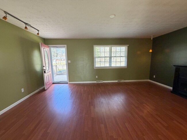 Photo - Goodyear Heights Gem with Fireplace, Attached Garage & Massive Backyard