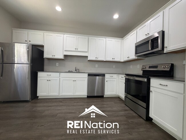 Photo - BROOKWOOD BEAUTY! 3BR/2BA | High Ceilings & Hardwood Floors | 2-Car Garage!