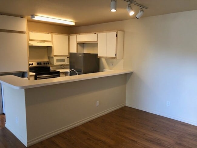 Photo - 1 Bedroom Luxury Living . . .  with 2 gated parking spots