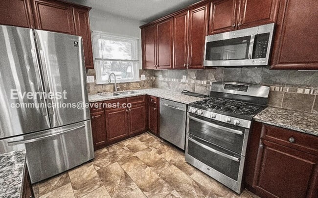 Photo - 3 Bed/3 Bath Home with Fenced Yard and Garage / Available Now!