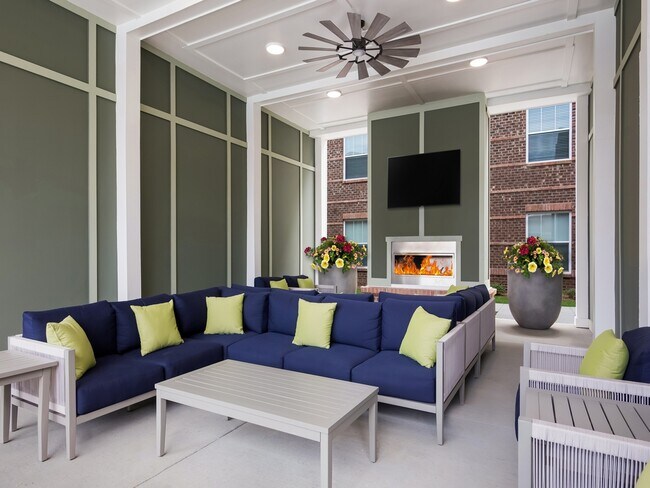 Outdoor Pavilion with Fireplace, TV and Lounge Seating