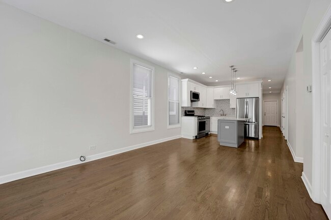 Building Photo - 1821 N Tripp Ave Unit 2