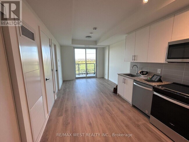 Photo - 409 Wheat Boom Dr. Unité 409