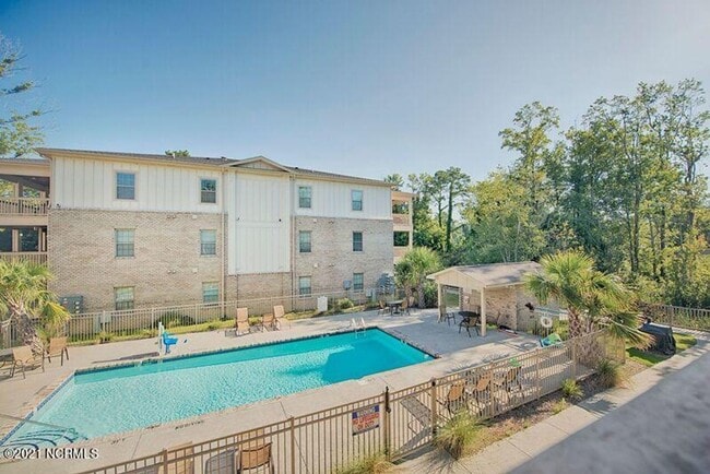 Photo - Experience the Heart of It All - at Covil Garden Condominiums! Unit Covil Garden