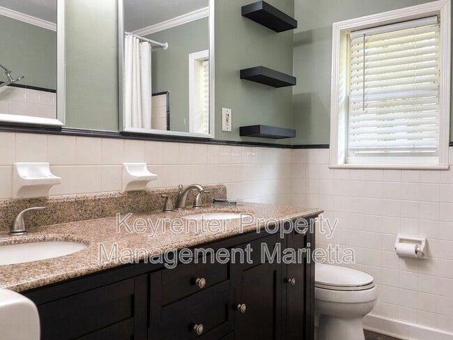 Photo - 725 McBurnette Rd N E