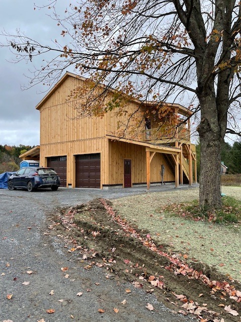New garage with separate upstairs tenant apartment. - 223 Huntley Rd