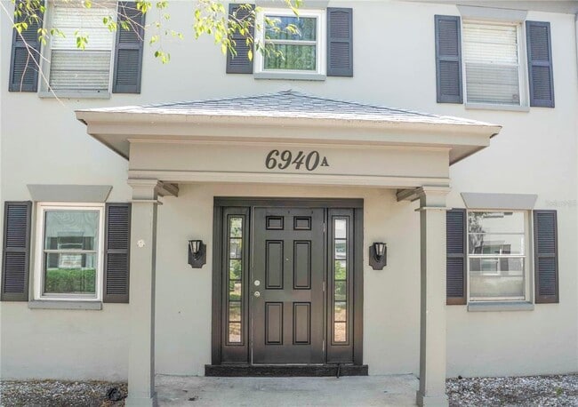 Building Photo - 6940 Sunset Dr S Unit 2D