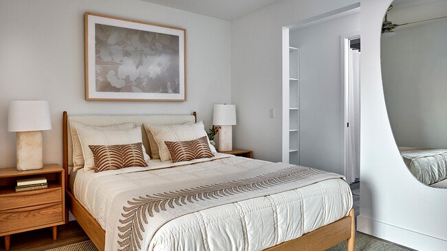 Apartment Bedroom with Wood Style Flooring - Griffis West Palm