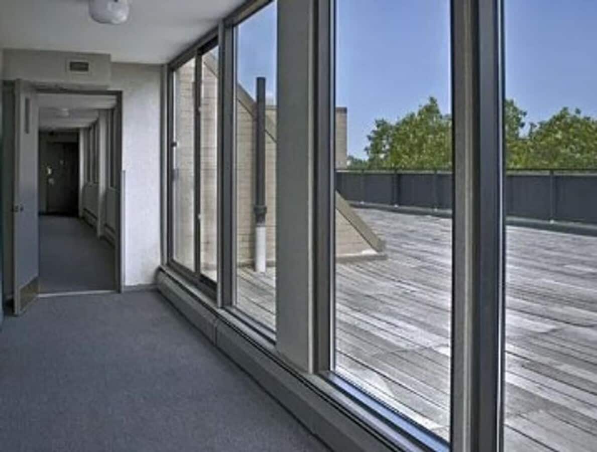 Photo - GREAT Studio! Right on Green Line. Laundry in building, roof deck, great view!