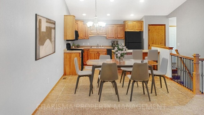 Photo - 3 BD, 2.5 BA TOWNHOME, DOUBLE ATTACHED GARAGE, PET FRIENDLY, WALK OUT DECK, LOTS OF SPACE!