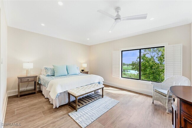 Building Photo - 6770 Pelican Bay Blvd Unit 242