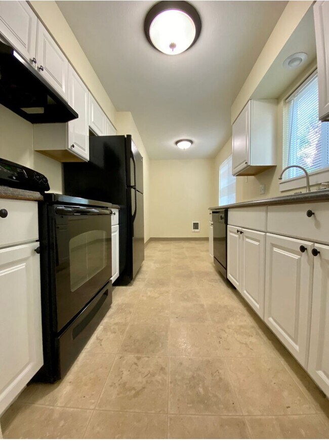 Photo - **50% OFF THE FIRST MONTH'S RENT** Montavilla 2 Bedroom Main Floor Apartment w/ A/C and Off Stree... Unit 9033