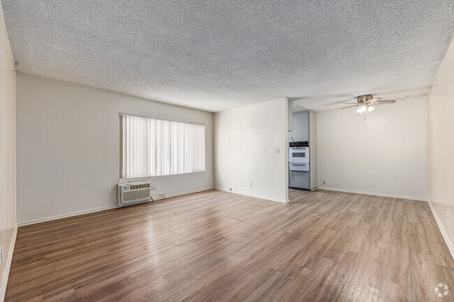 2BR, 2BA - 842SF - Living Room - The Burbank Towers