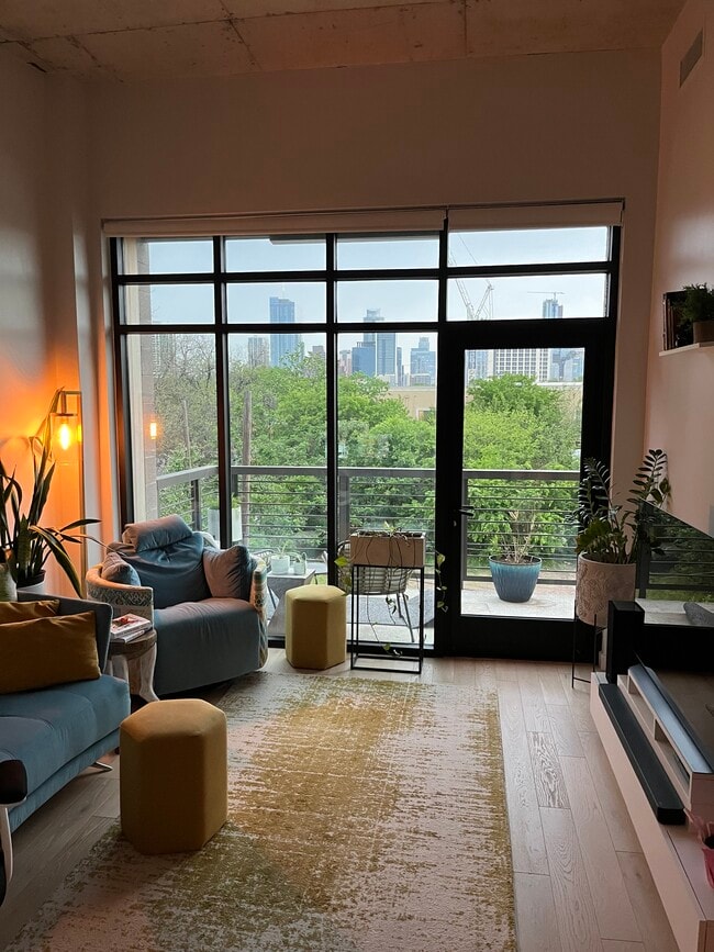 Floor to ceiling windows. - 1501 E 4th St Unit 307