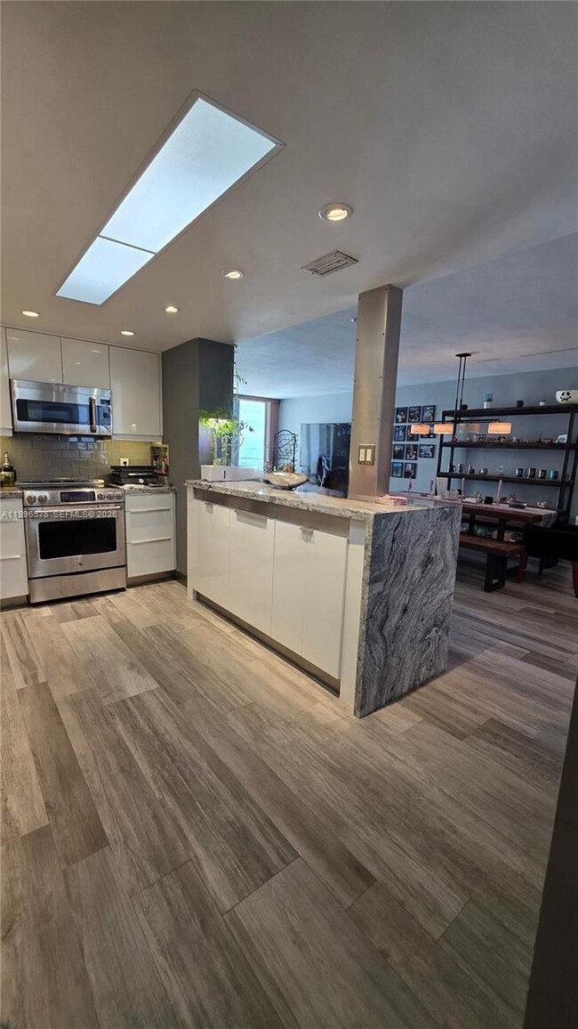 Photo - 5825 Collins Ave Unit 8J