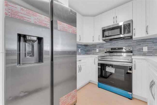Building Photo - 7640 NW 182nd Terrace Unit 0 Rental