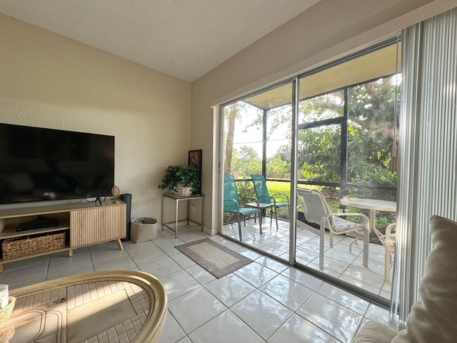Photo - 5-Min Walk to FAU – Private Room in Furnished 2/2 Condo w/ Pool & Canal Views – $1,700