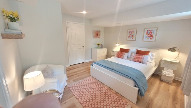 Fresh, bright bedroom with quality mattress - 122 Phillips Cir Unit The Flat at Phillips Rental