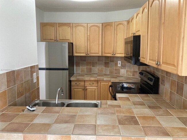 Photo - 6995 NW 186th St Unit E403