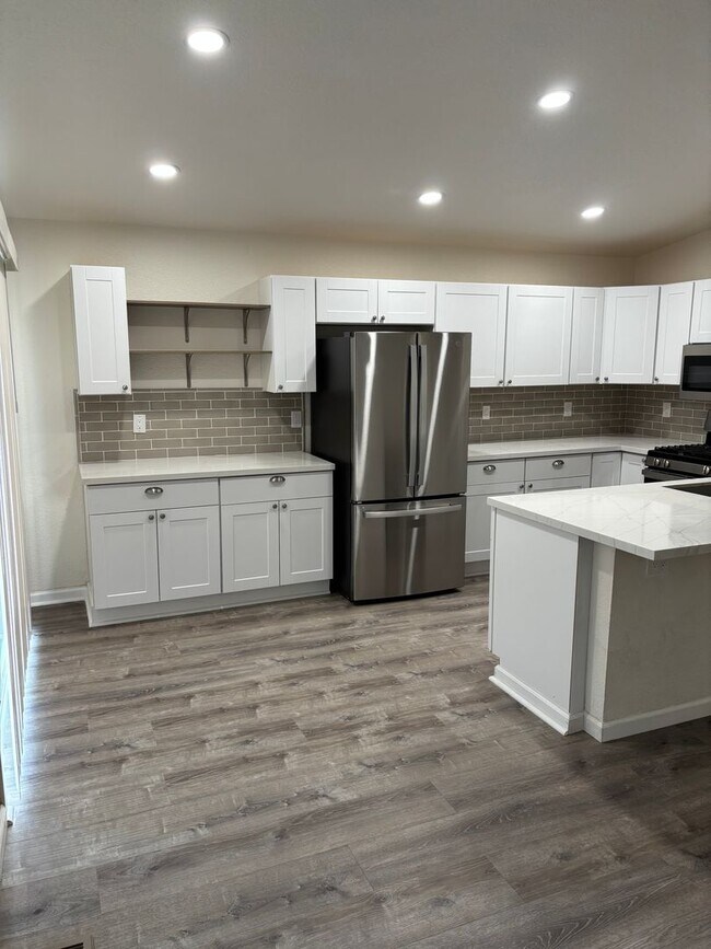 Photo - Freshly Remodeled 4 bedroom in Red Rock- RV Parking, low maintenance yard and pets welcome!